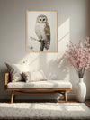 This stunning illustration features a majestic owl perched on a branch, exuding an air of wisdom and tranquility. The owl's round face and large, dark eyes capture attention, while its white feathers with brown and beige patterns add depth and realism to the depiction. The few green leaves on the branch add a touch of natural beauty, complementing the detailed artwork. "Guardian of the Forest" is perfect for adding a touch of elegance and nature-inspired charm to any space, making it a captivating addition 