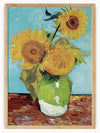 This image is a vibrant and colorful painting of sunflowers in a vase, reminiscent of Vincent van Gogh's famous series of sunflower paintings. The artwork features three large sunflowers with bright yellow petals and intricate brown centers, arranged in a green vase. The background is a light blue, contrasting beautifully with the warm tones of the flowers and the earthy hues of the table surface. The brushstrokes are bold and expressive, capturing the lively and dynamic essence of the sunflowers. This pain